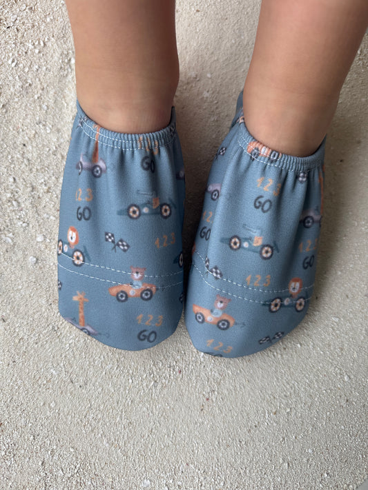 Badeschuhe - Tiererennen